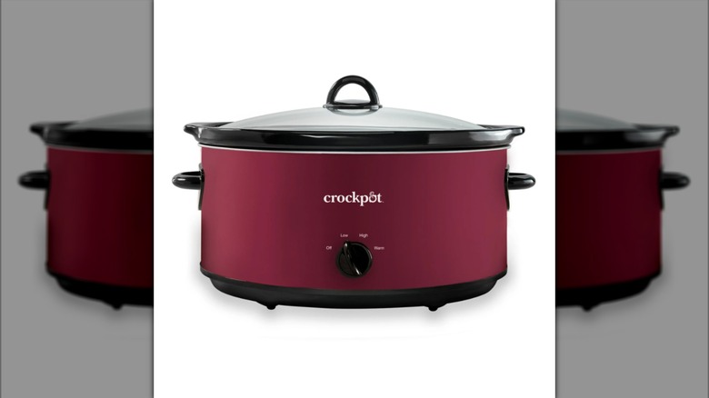 large burgundy-colored Crock-Pot on white background