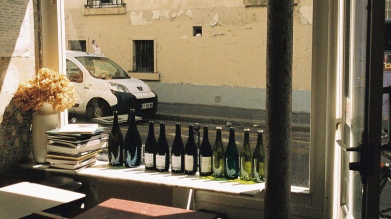 sunny window with wine bottles