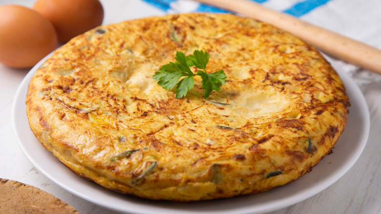 whole Spanish tortilla on plate