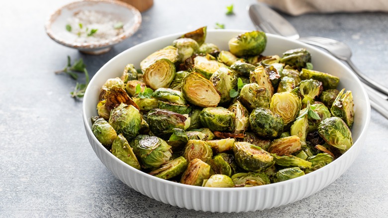 Roasted Brussels sprouts in bowl on table