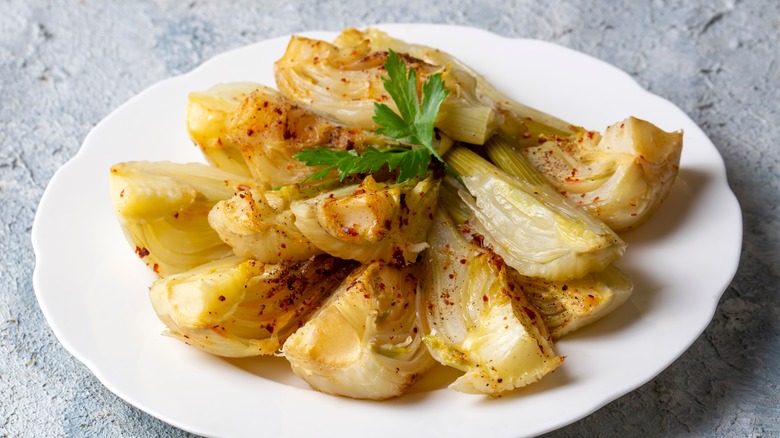 Baked fennel on white plate