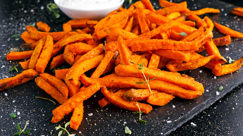 Sweet potato fries on cutting board