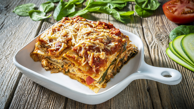 Vegetable lasagna in white dish 