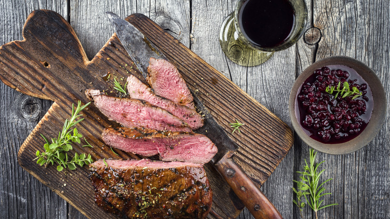 sliced venison with red wine