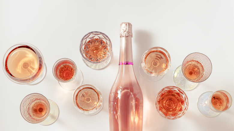 sparkling rosé bottle and glasses