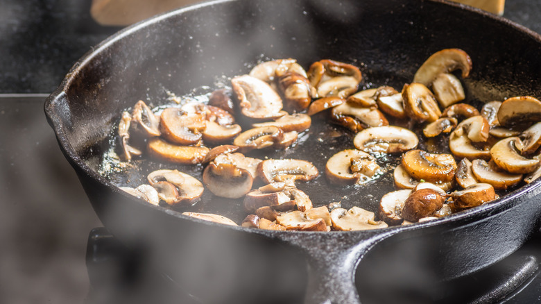 mushrooms cooking in pan