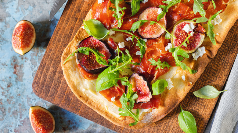 pizza with fresh arugula