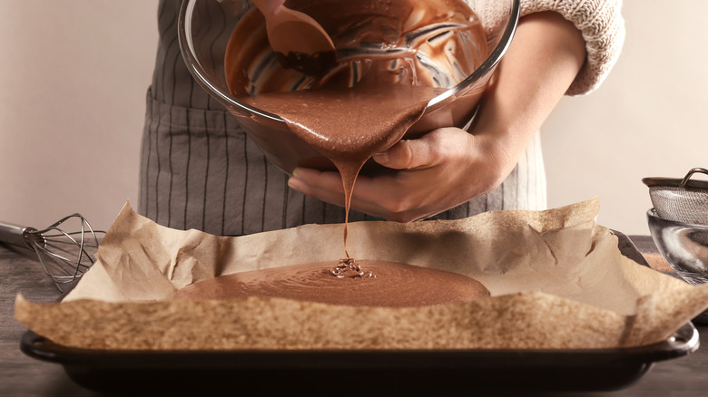 Pouring batter onto parchment paper