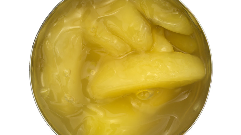 Opened can of sliced apples