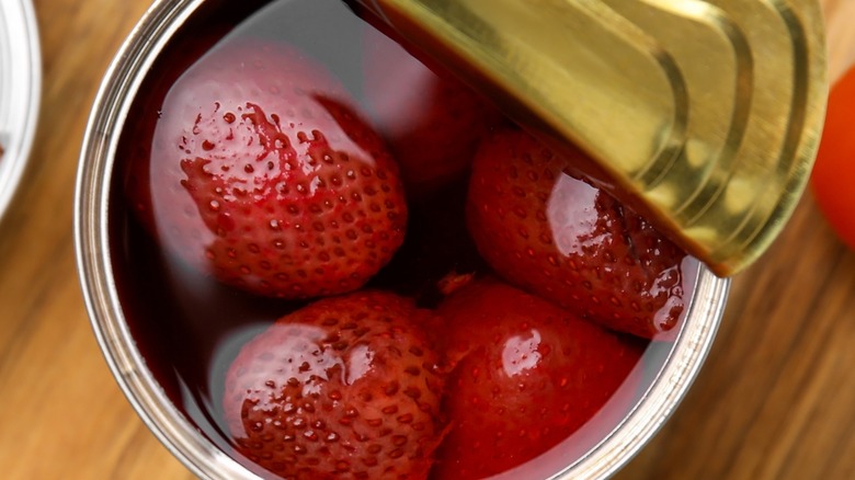 Close up of opened can of strawberries