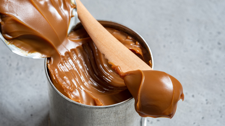 Opened can of dulce de leche