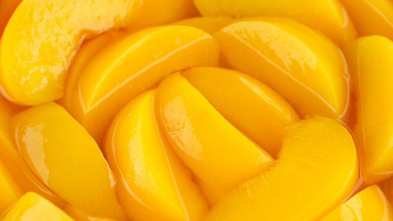 Close up of canned peach slices