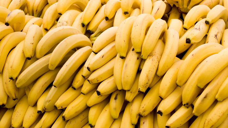 Bunches of bananas piled up