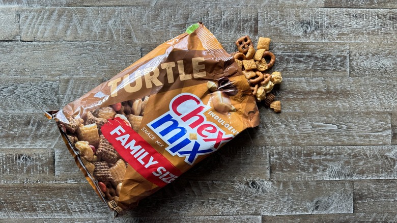 opened bag of Turtle Chex Mix on table