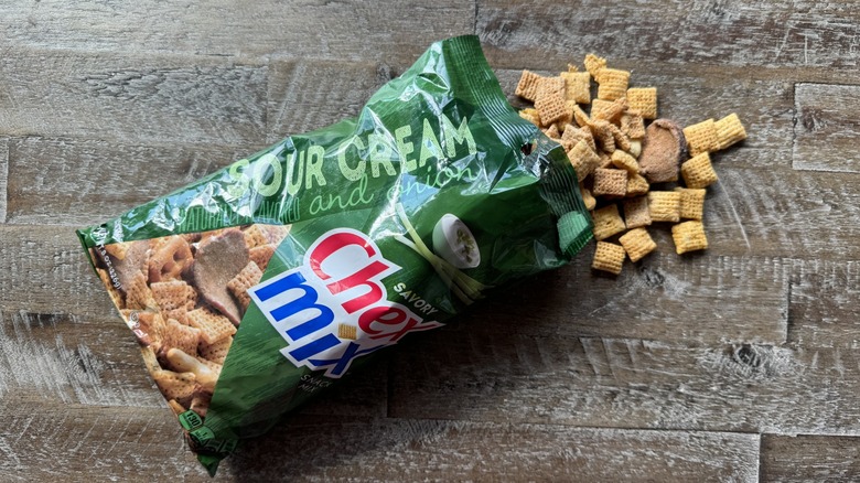 Sour cream and onion Chex Mix opened on table