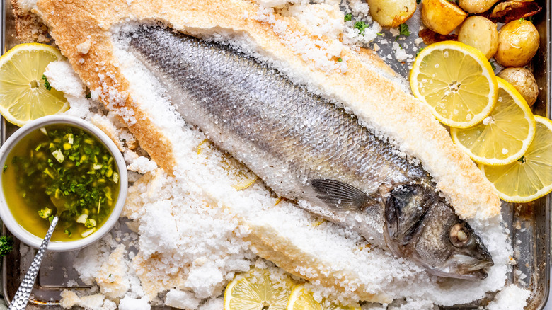 Salt-crusted fish with lemon
