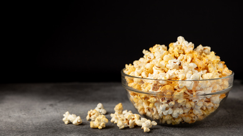 Glass bowl of fresh popcorn