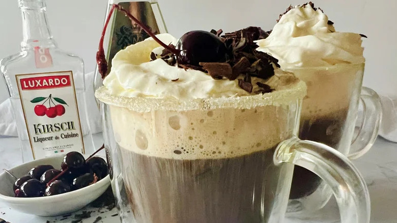 Luscious Black Forest coffee in glass mug with cherry on top