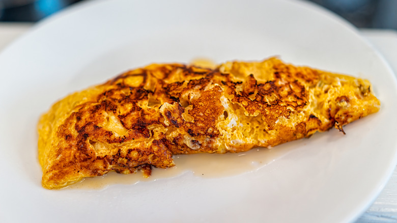 burnt omelet on a plate