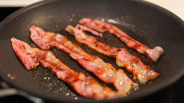 bacon cooking in a pan