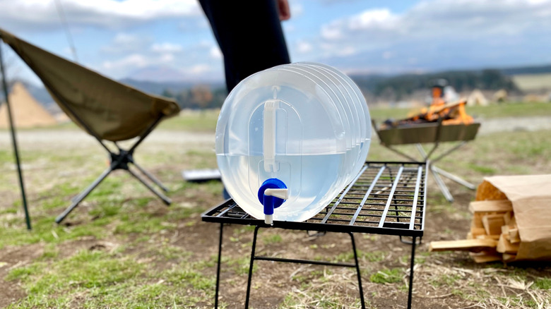 Camping water jug on table