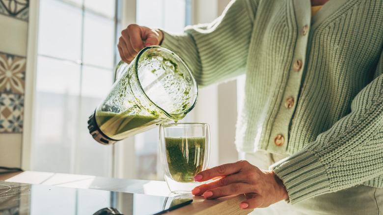 Green smoothie in blender