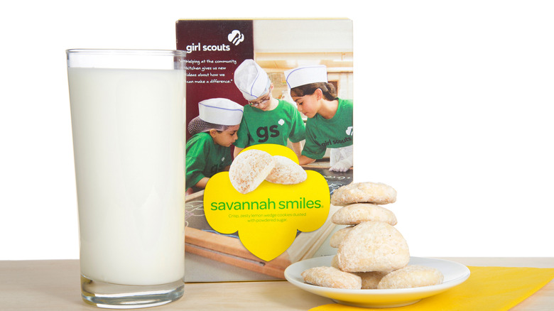 Plated box of Savannah Smiles next to a glass of milk