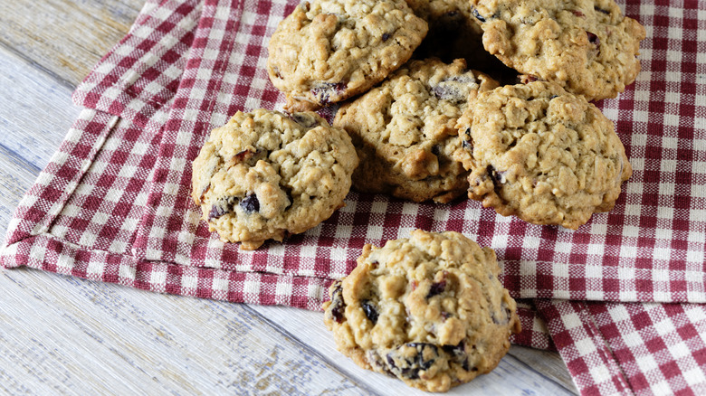 Oatmeal cookies on a red gingham tablecloth