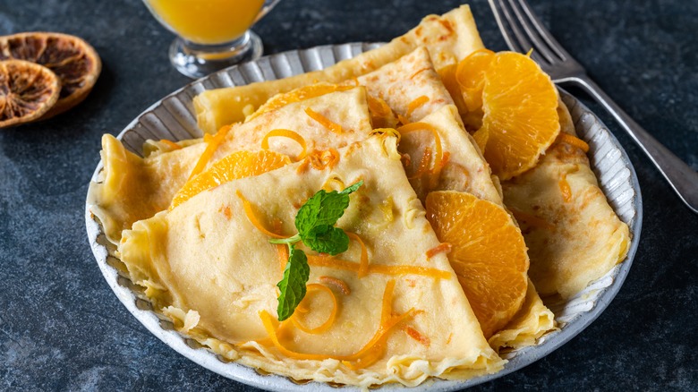 crepe suzette plated with oranges