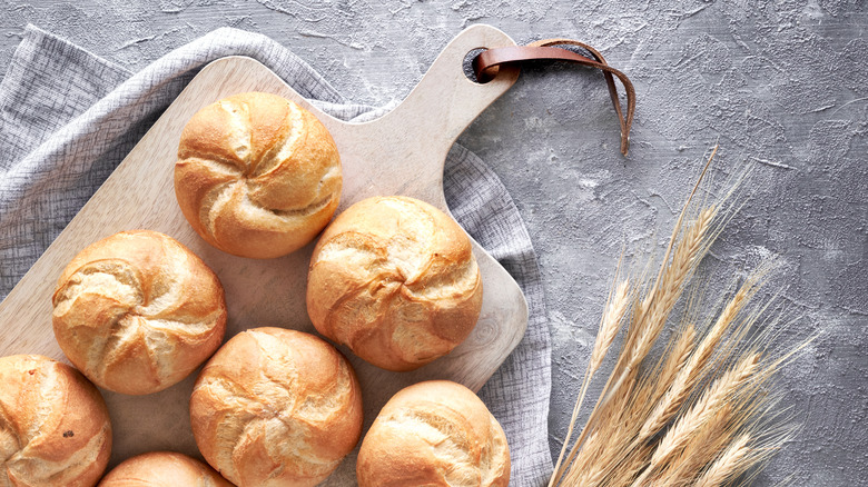 kaiser rolls on a serving board