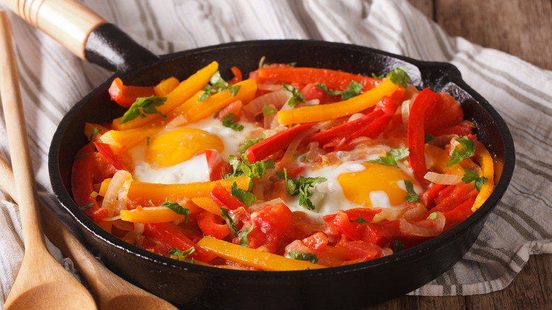 Eggs Piperade in a pan