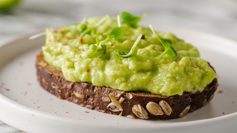 Plate with avocado toast 