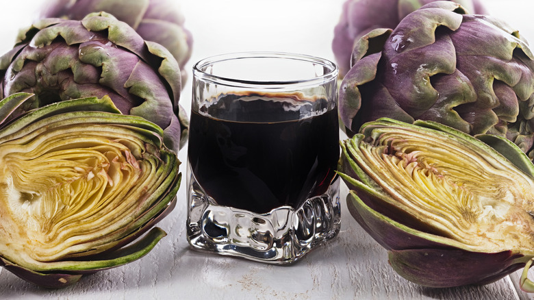 glass of cynar with artichokes