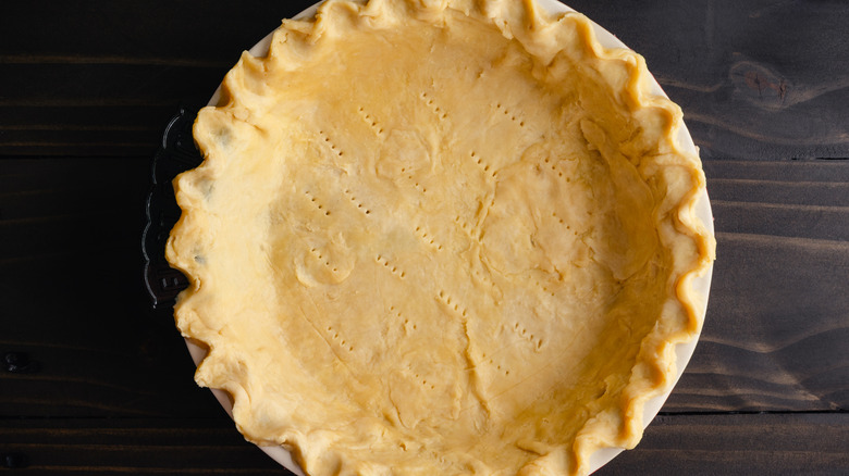 Crimped pie crust with holes on the bottom