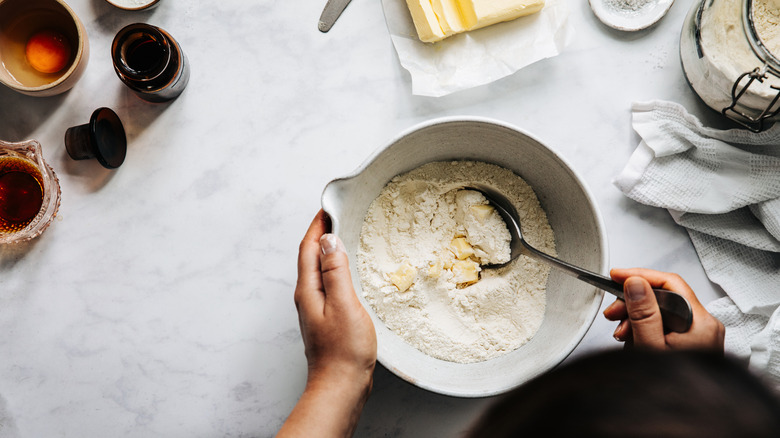 Butter in a bowl with flour
