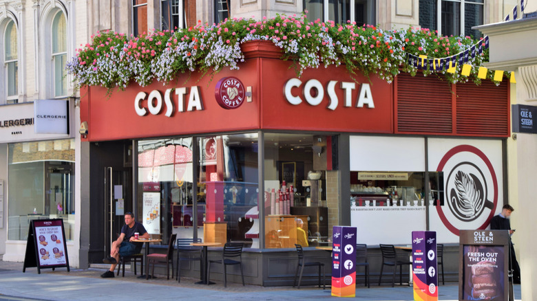 A Costa coffee shop on a street corner