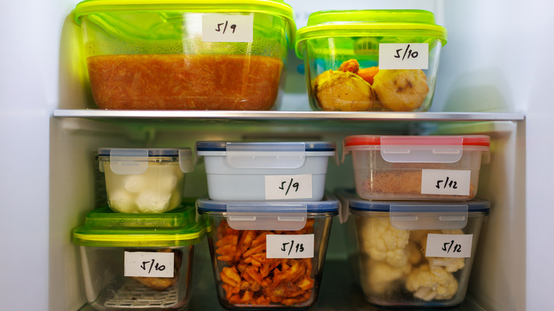 leftover food containers in fridge