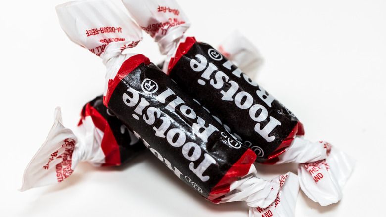 Tootsie Rolls on white background