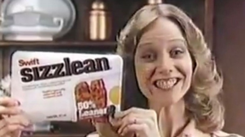 woman holding swift Sizzlean 