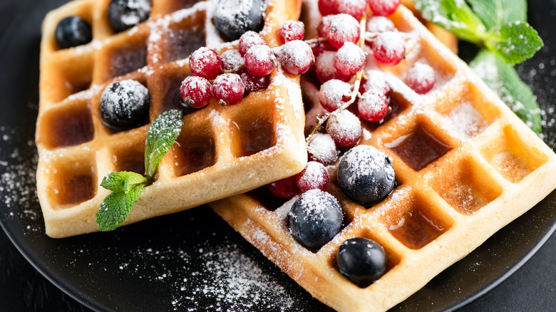 waffles with fruit and powdered sugar