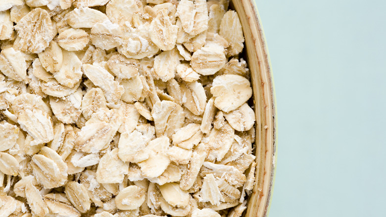 Close-up oats in wood container