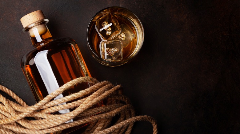 Rope-tied whiskey bottle