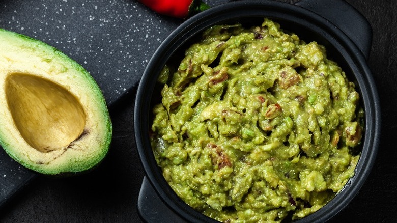 Bowl of guacamole with avocado