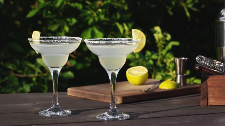 Two margaritas on a bar