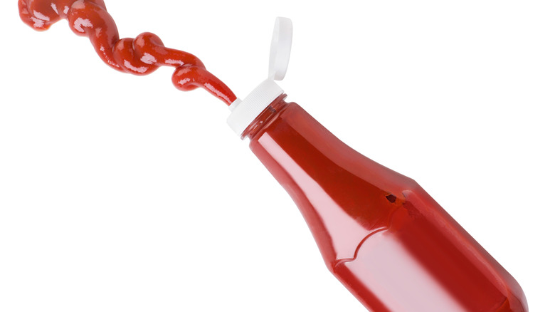 Open bottle of ketchup