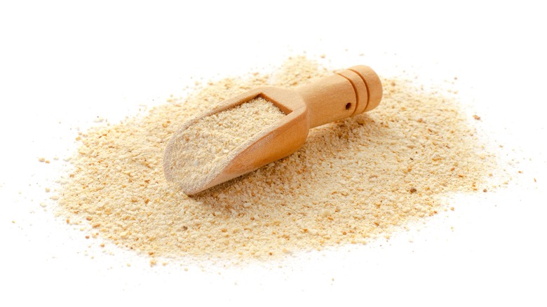 breadcrumbs with scoop on white background