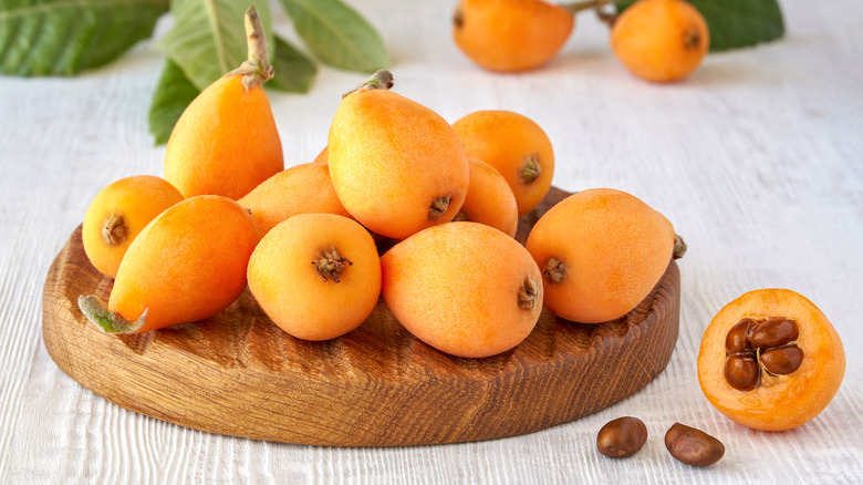 Plate of fresh loquat fruit