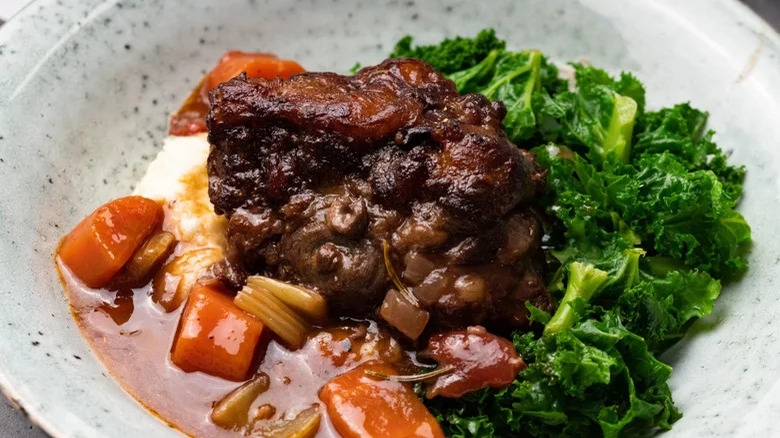 Braised oxtail stew with greens