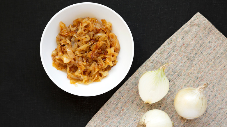 caramelized onions in bowl raw onions