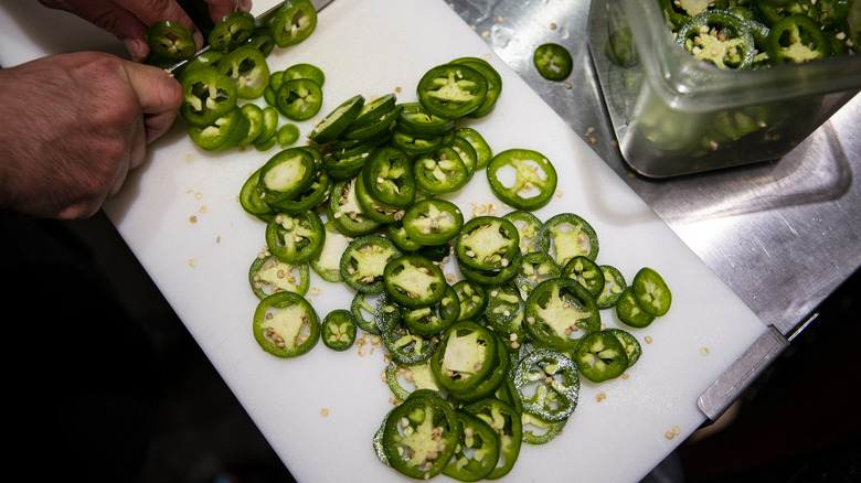 Cutting fresh jalapeños